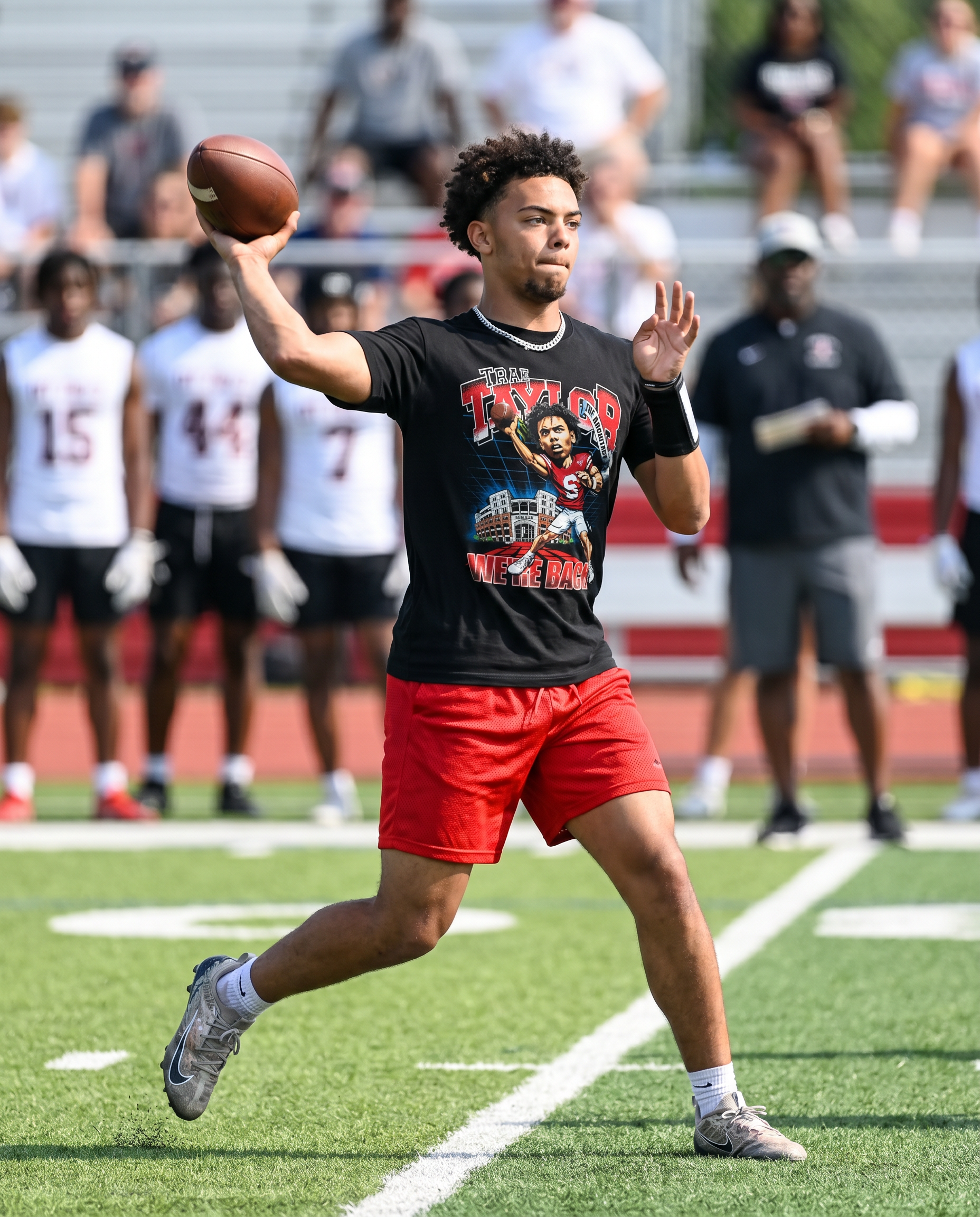 Trae Taylor wearing The Architect Tee at OT7 camp — the original moment that unlocked the early drop