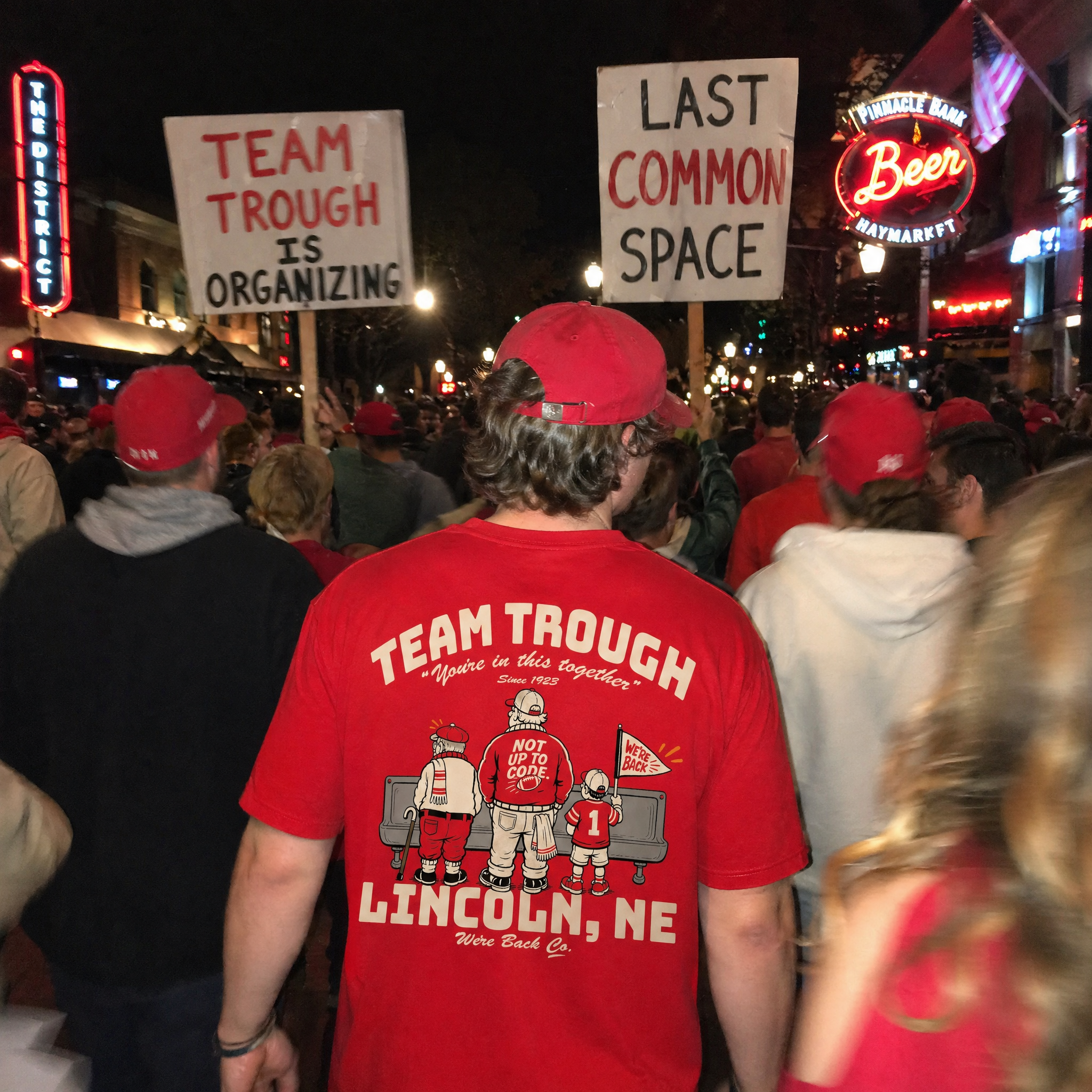 Nebraska fans marching for the Team Trough Tee in Lincoln, NE — We're Back Co.