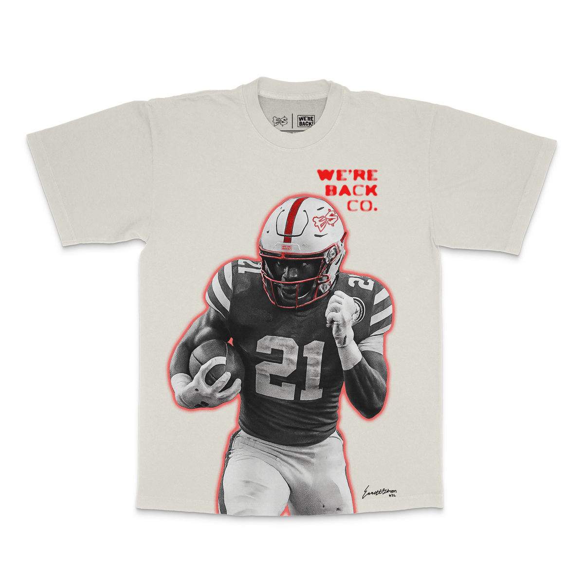 T-shirt with a football player graphic and 'We're Back' text on a beige background