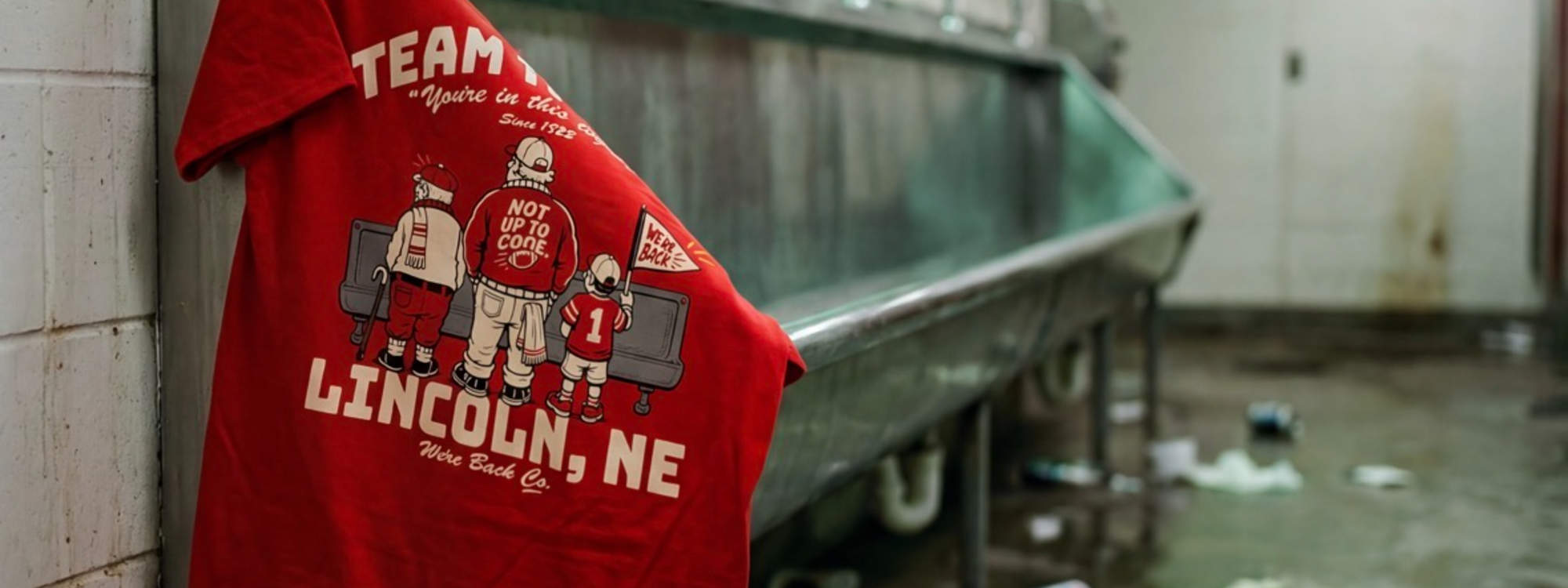 Team Trough — objectively unsanitary, historically significant. Final-season gear from We're Back Co., Lincoln, Nebraska.