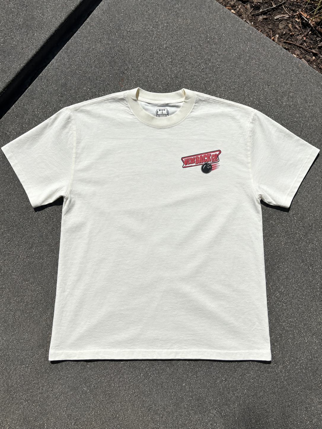 Original sample photo: cream 1ST & TEN PINS Tee front with WBC bowling logo