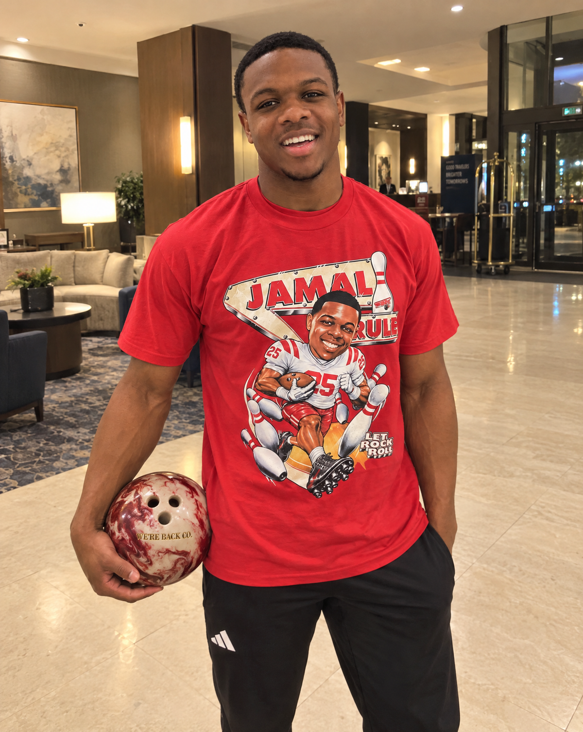 Campaign styling for Jamal Rule Let Rock Roll Tee · Red
