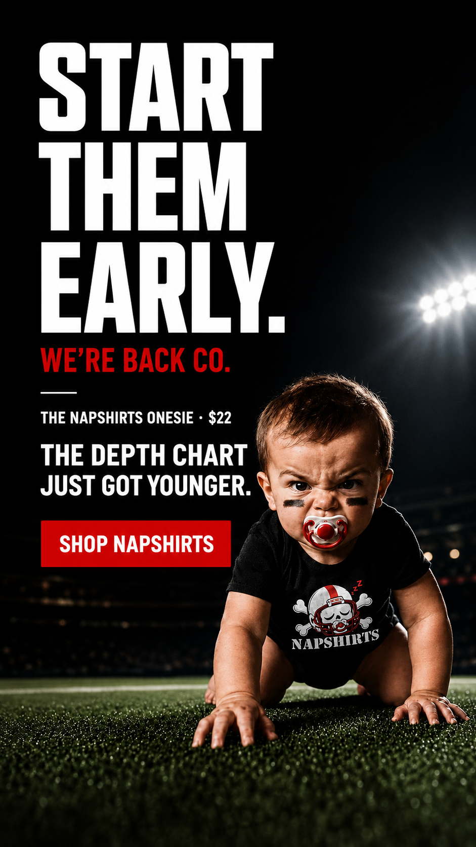Start them early. The Napshirts Onesie, $22. The depth chart just got younger. Baby in the black Napshirts onesie crawling on a floodlit field at night.